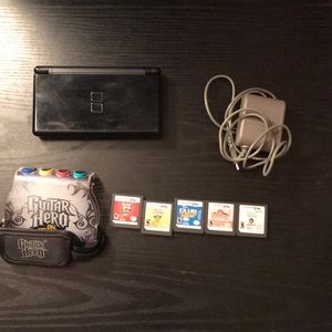 Nintendo ds lite with charger, carrying bag, games